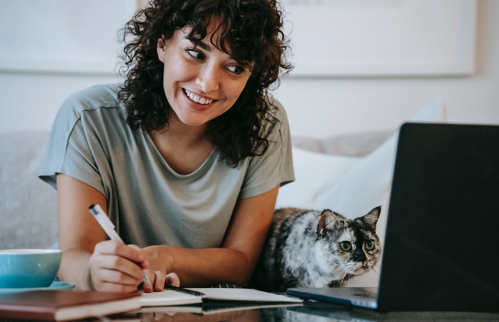 Image of woman at home on an e-learing course