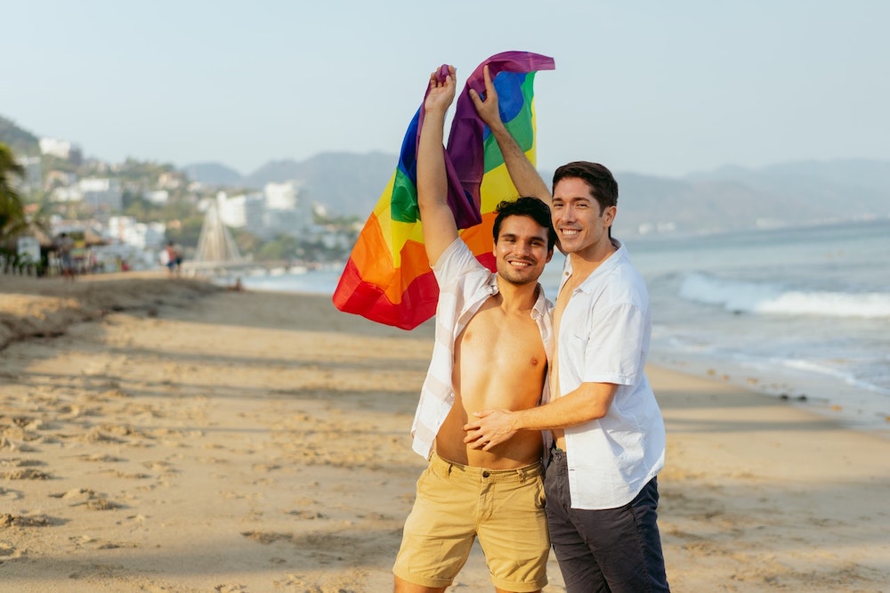 Queer men on beach